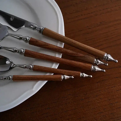 Ornate silver and wood stainless steel tableware set dining room