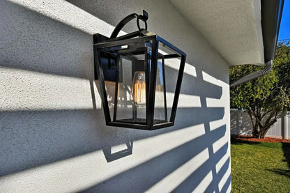 Industrial black wrought iron outdoor wall light with glass shades