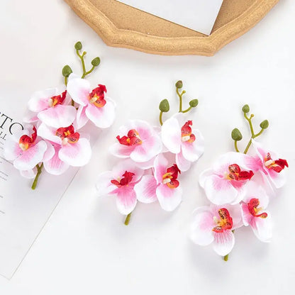 Pink and white artificial flower stems for wedding garden arch decor