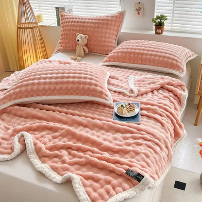 Pink and white textured cozy faux rabbit fur throw blanket bedroom