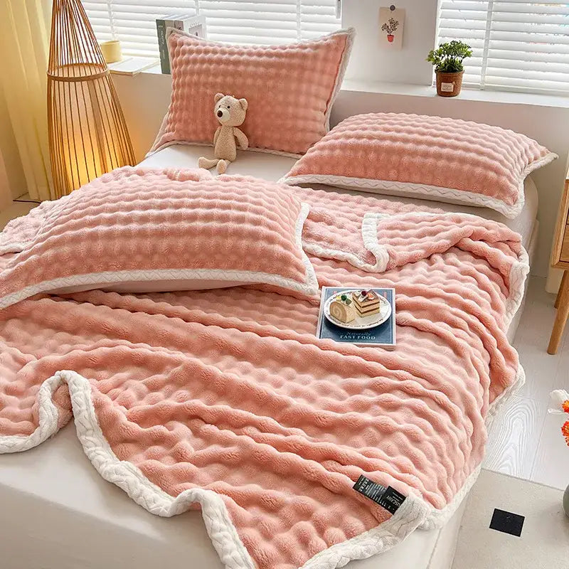 Pink and white textured cozy faux rabbit fur throw blanket bedroom