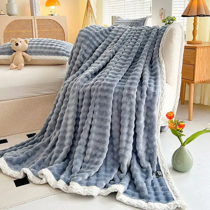 Pink and white textured cozy faux rabbit fur throw blanket bedroom