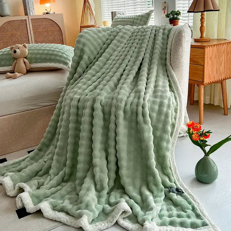 Pink and white textured cozy faux rabbit fur throw blanket bedroom