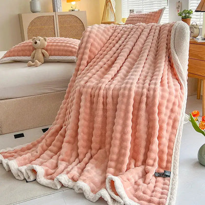 Pink and white textured cozy faux rabbit fur throw blanket bedroom