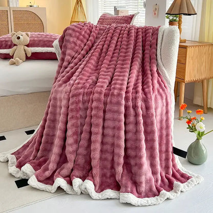 Pink and white textured cozy faux rabbit fur throw blanket bedroom