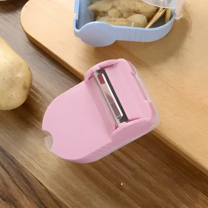 Pink translucent carrot snail peeler kitchen vegetable tool