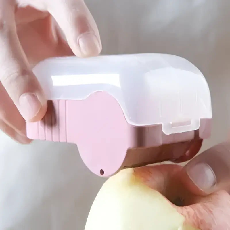 Pink translucent carrot snail peeler kitchen vegetable tool