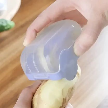 Pink translucent carrot snail peeler kitchen vegetable tool