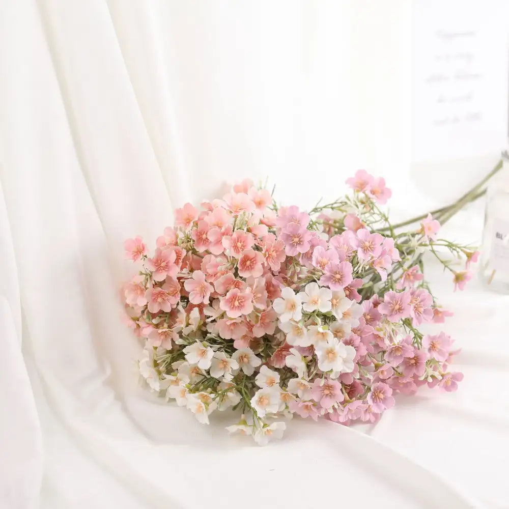 Pink & white artificial flowers baby’s breath wedding bouquet