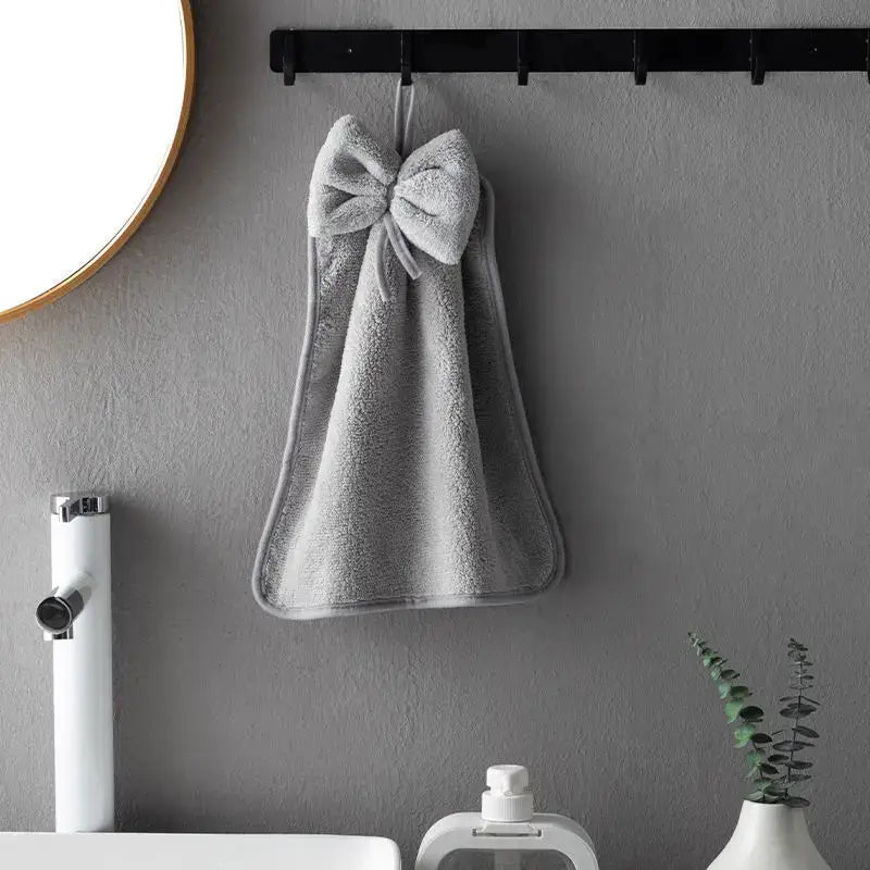 Plush coral velvet soft hand towels with bows for kitchen and bathroom