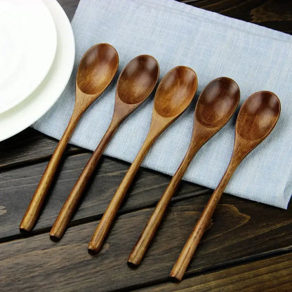 Polished dark brown wooden spoon soup and fork set dining room