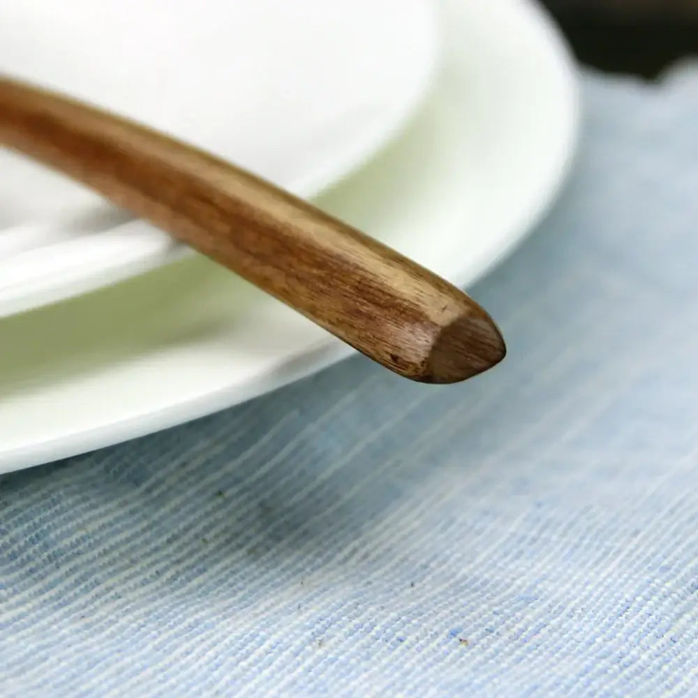 Polished dark brown wooden spoon soup and fork set dining room