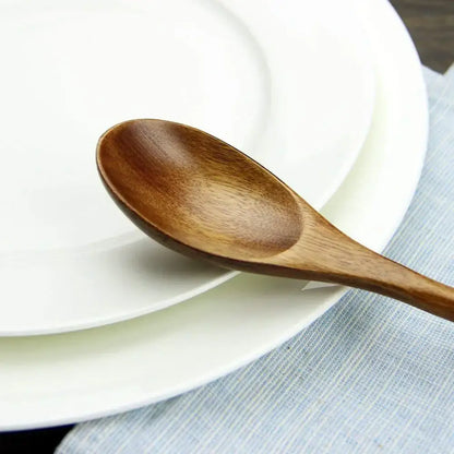 Polished dark brown wooden spoon soup and fork set dining room