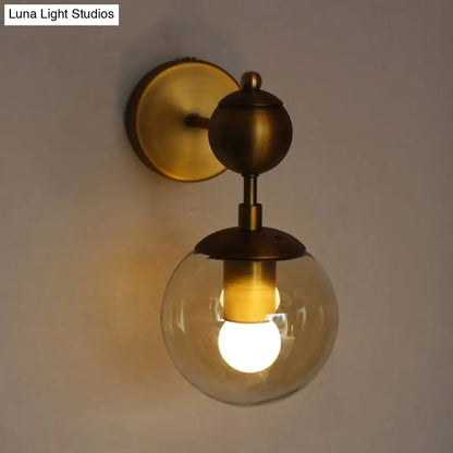DecorBites™ Post Modern Amber Glass Globe Wall Sconce with Brass Mount - 1/2 Light