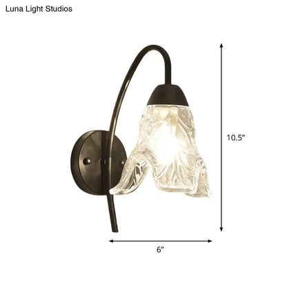 Post-modern black metal wall sconce with clear crystal shade bedroom