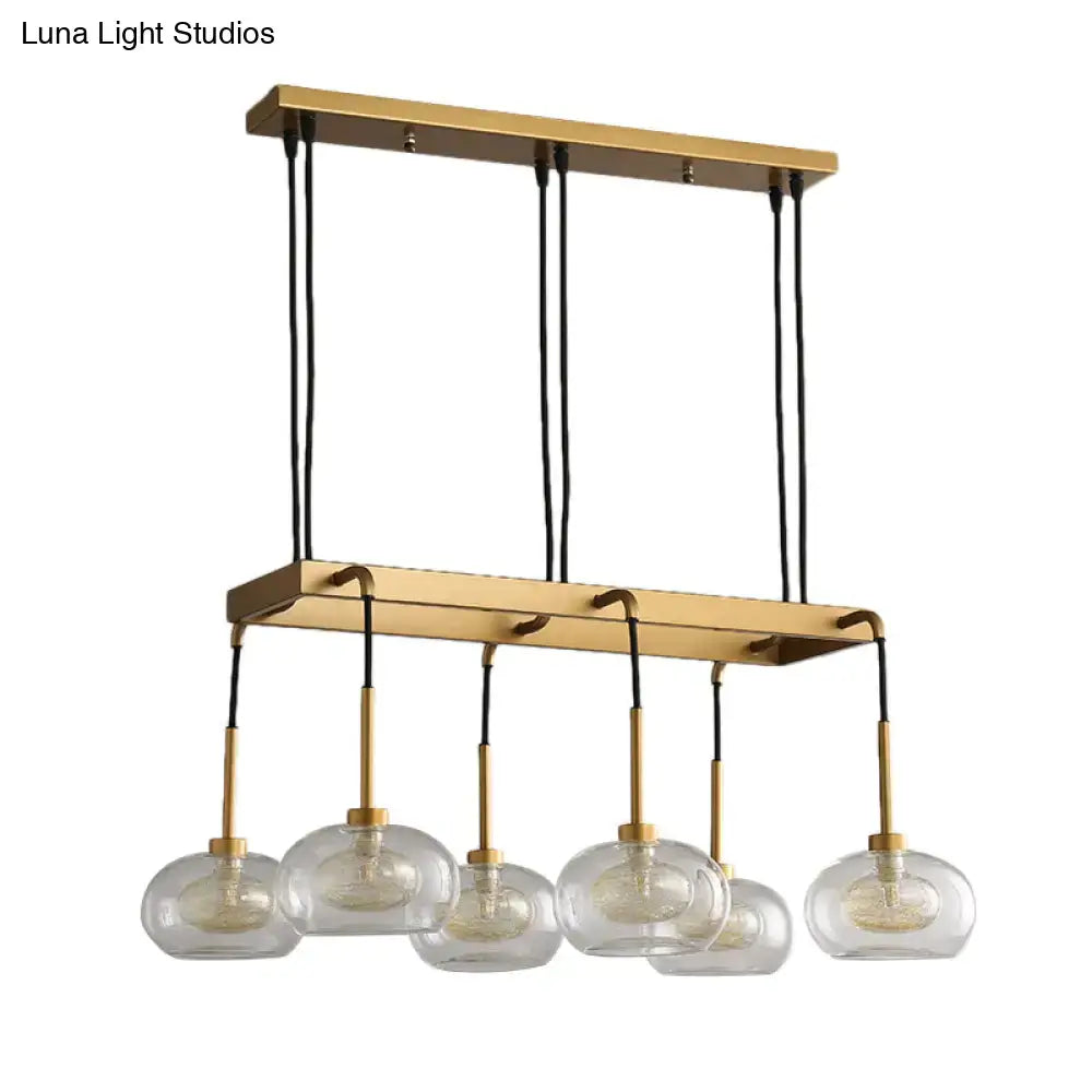 Post-modern gold metal finish island chandelier with clear glass kitchen