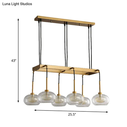 Post-modern gold metal finish island chandelier with clear glass kitchen