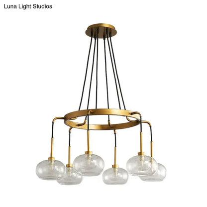 Post-modern gold metal finish island chandelier with clear glass kitchen