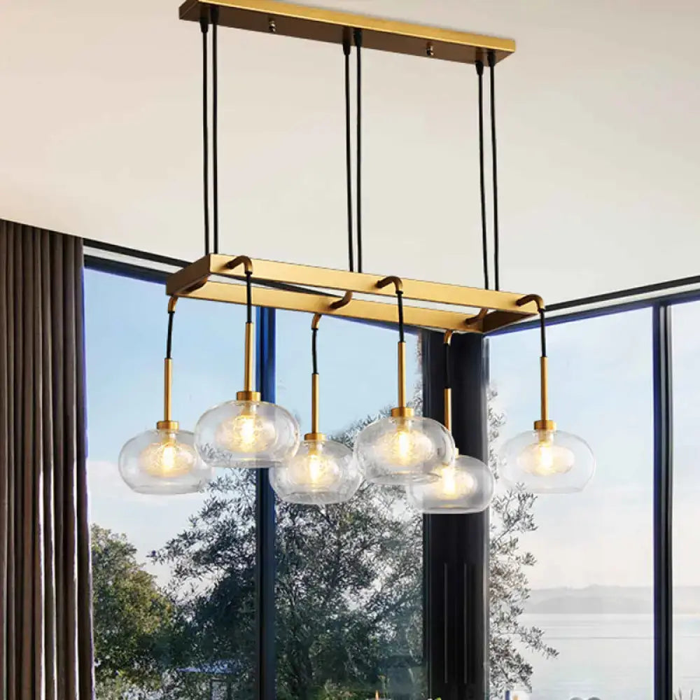 Post-modern gold metal finish island chandelier with clear glass kitchen