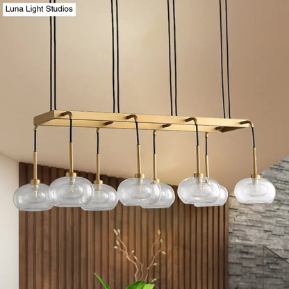Post-modern gold metal finish island chandelier with clear glass kitchen