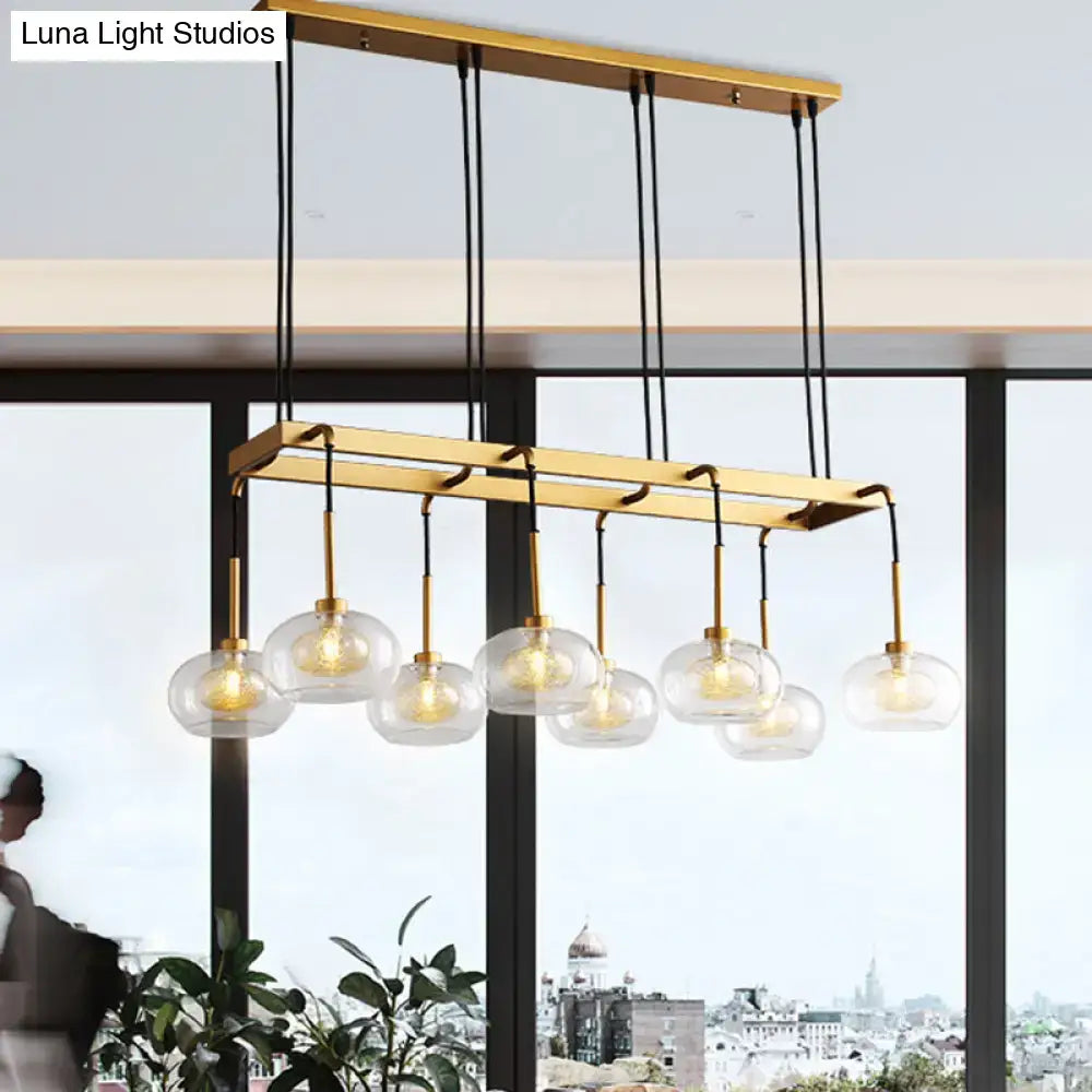 Post-modern gold metal finish island chandelier with clear glass kitchen