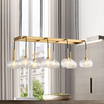Post-modern gold metal finish island chandelier with clear glass kitchen
