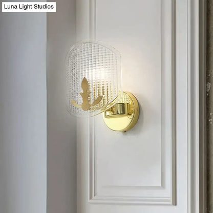 Post-modern gold wall sconce with clear lattice glass bedroom light