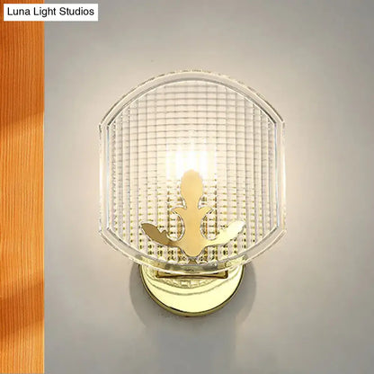 Post-modern gold wall sconce with clear lattice glass bedroom light