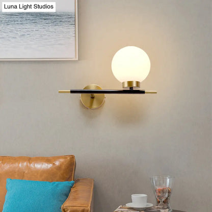 DecorBites™ Post-Modern White Glass Sphere Wall Sconce with Brass Finish - 1/2 Bulbs