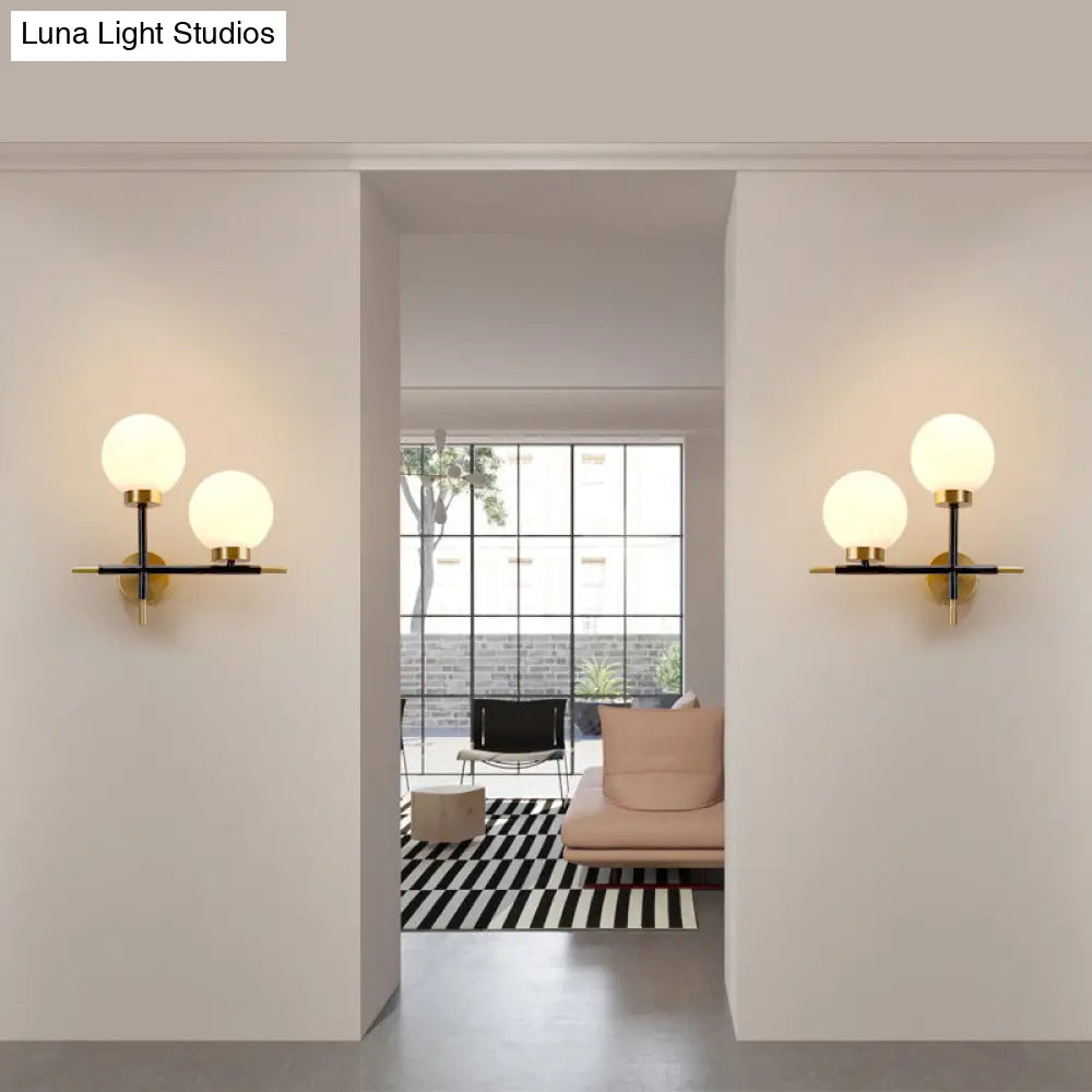 DecorBites™ Post-Modern White Glass Sphere Wall Sconce with Brass Finish - 1/2 Bulbs