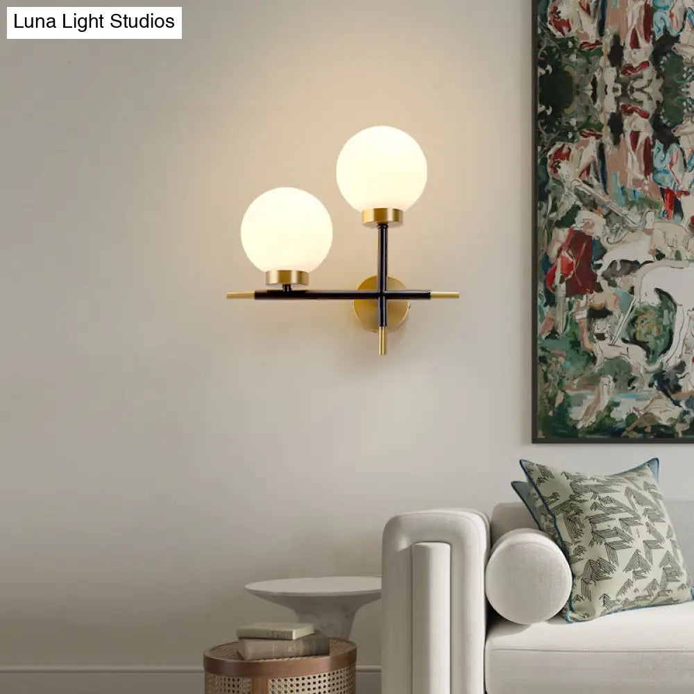 DecorBites™ Post-Modern White Glass Sphere Wall Sconce with Brass Finish - 1/2 Bulbs