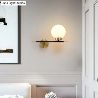 DecorBites™ Post-Modern White Glass Sphere Wall Sconce with Brass Finish - 1/2 Bulbs
