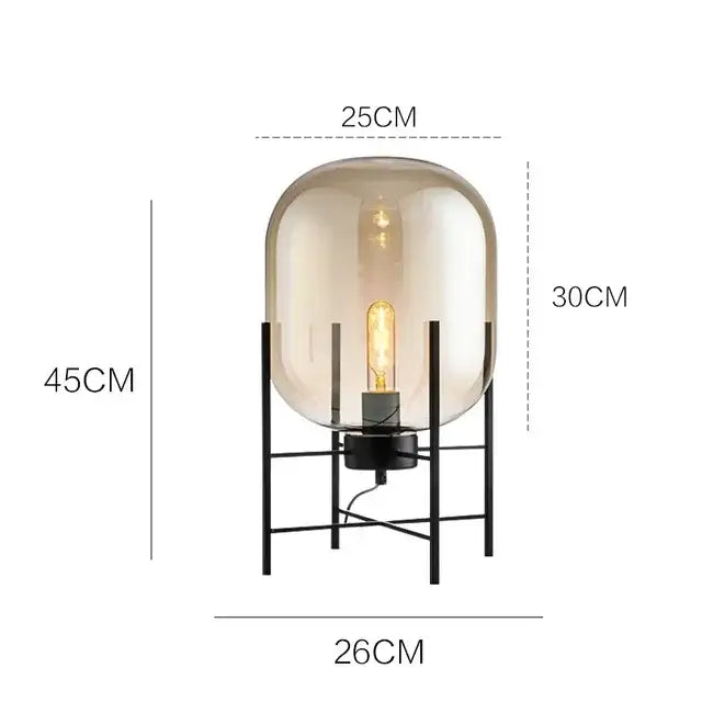 Postmodern amber glass ball floor lamp – living room black metal frame