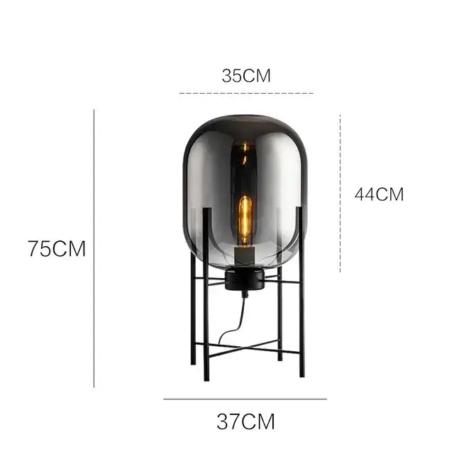 Postmodern amber glass ball floor lamp – living room black metal frame