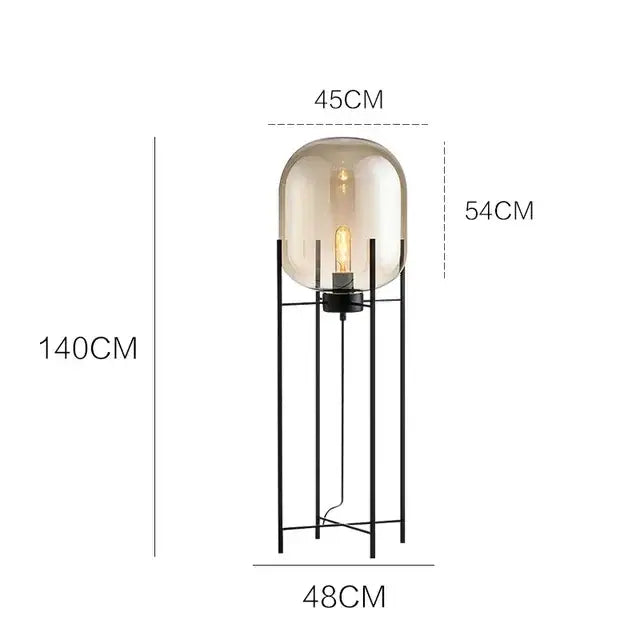 Postmodern amber glass ball floor lamp – living room black metal frame