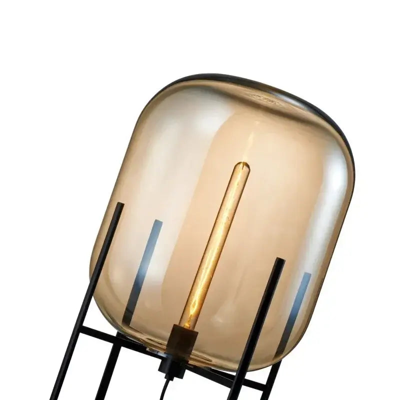 Postmodern amber glass ball floor lamp – living room black metal frame