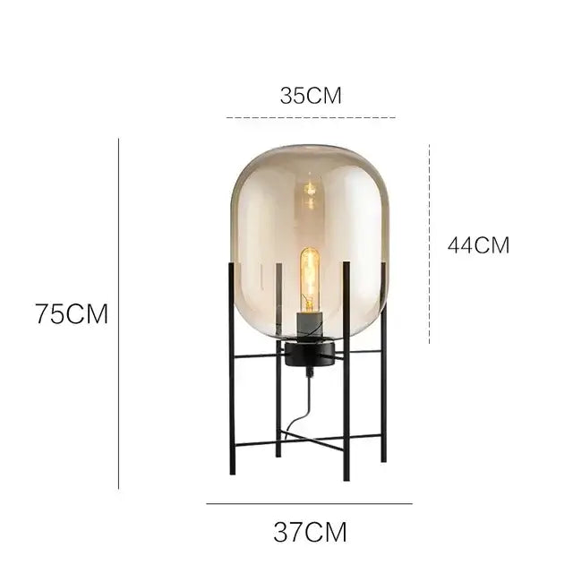 Postmodern amber glass ball floor lamp – living room black metal frame