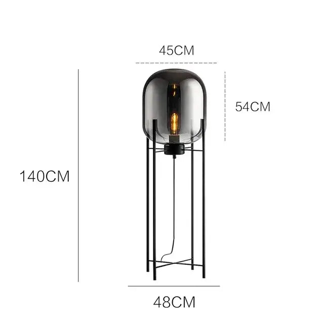 Postmodern amber glass ball floor lamp – living room black metal frame