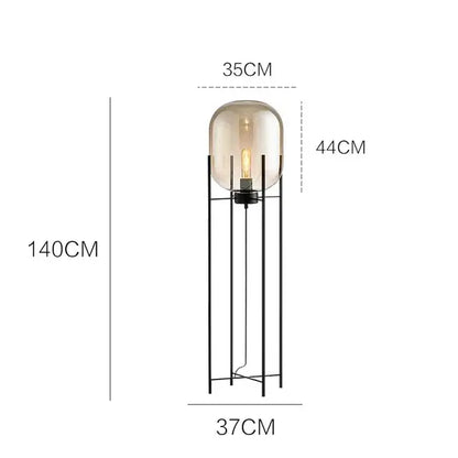Postmodern amber glass ball floor lamp – living room black metal frame