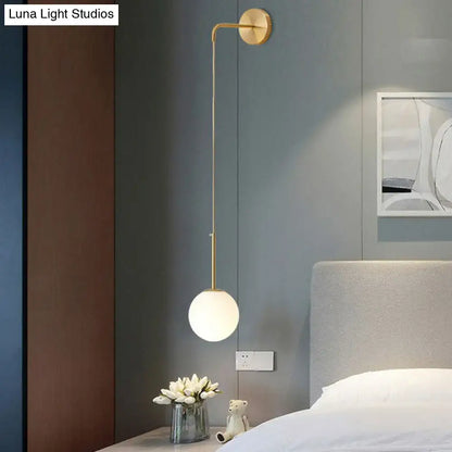 Postmodern black wall lamp with frosted glass globe for bedroom