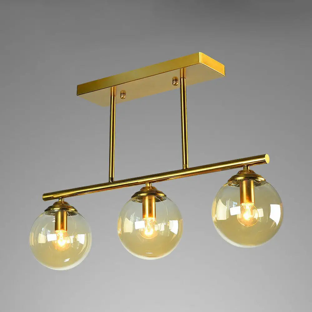DecorBites™ Postmodern Brass Island Light with Globe Glass Shade: Stylish Metal Ceiling Fixture