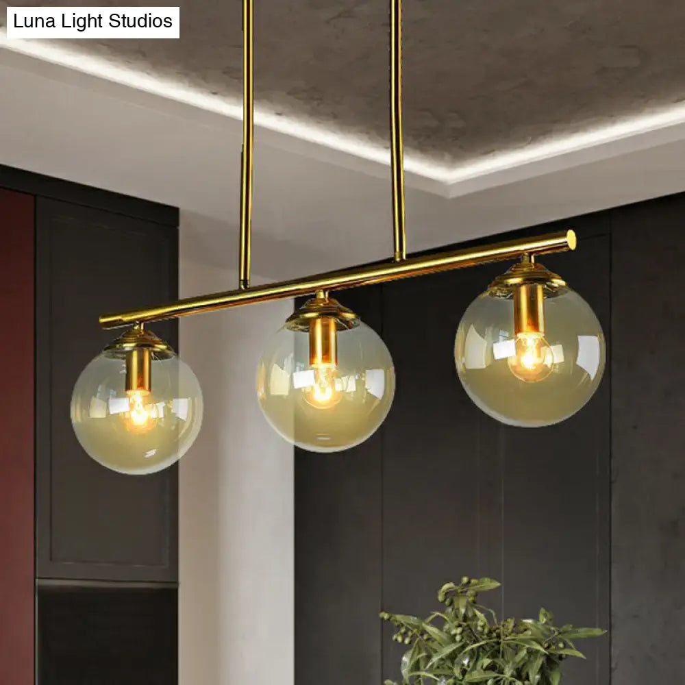 DecorBites™ Postmodern Brass Island Light with Globe Glass Shade: Stylish Metal Ceiling Fixture