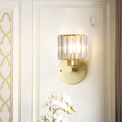 Postmodern gold wall lamp with prismatic crystal shade bedroom sconce