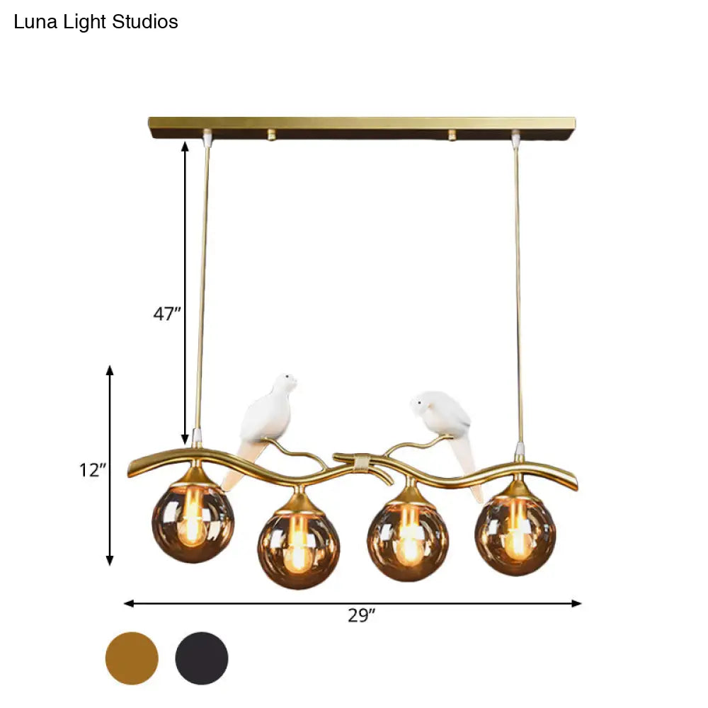 DecorBites™ Postmodern Iron Pendant Light with 4-Lights, Black/Gold Finish, Amber Ball Glass Shade, Bird Deco - Sprig Island