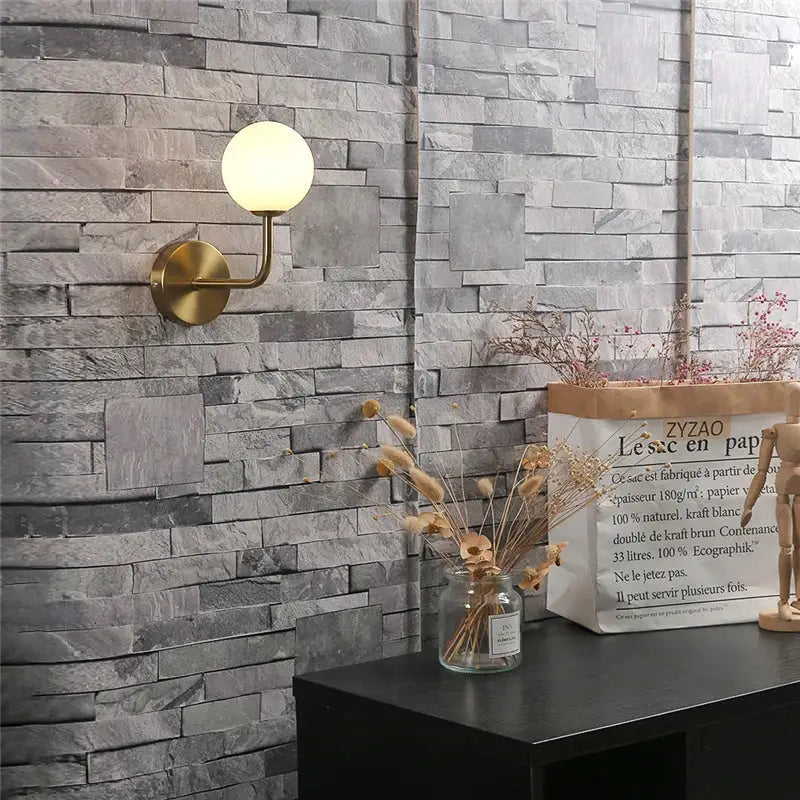 Retro brass curved wall lamp with clear glass ball for bedroom