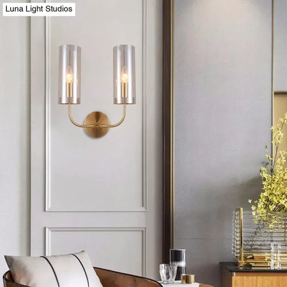 Retro brass wall mount lamp with smoked glass shade – living room