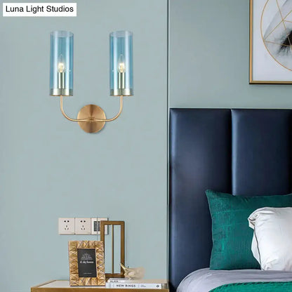 Retro brass wall mount lamp with smoked glass shade – living room