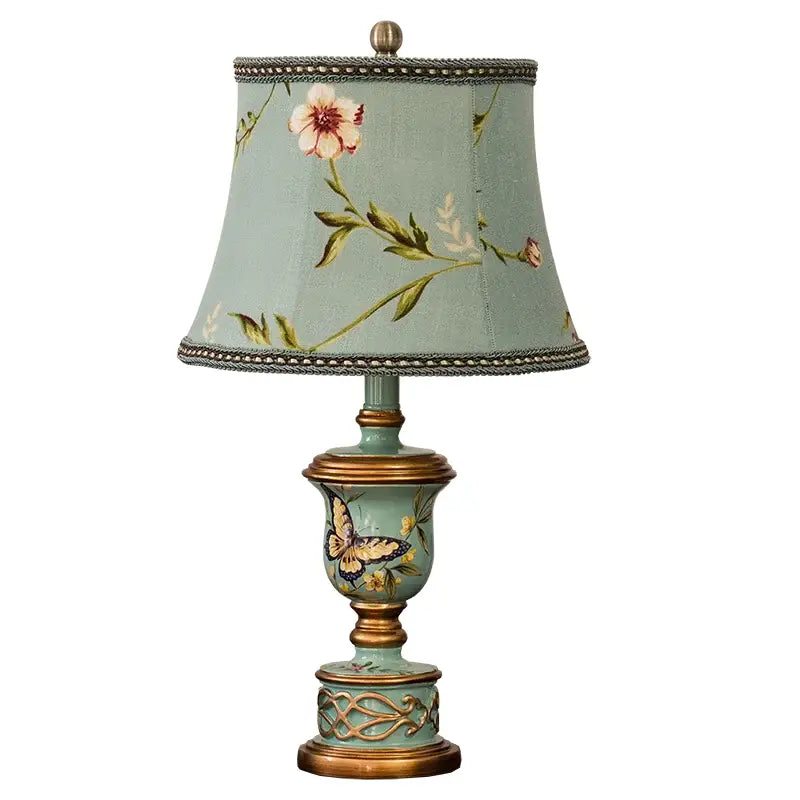 Retro mint green resin table lamp with butterfly detail bedroom light