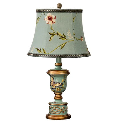 Retro mint green resin table lamp with butterfly detail bedroom light