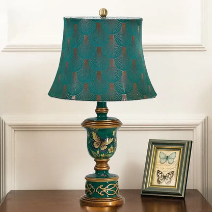 Retro mint green resin table lamp with butterfly detail bedroom light